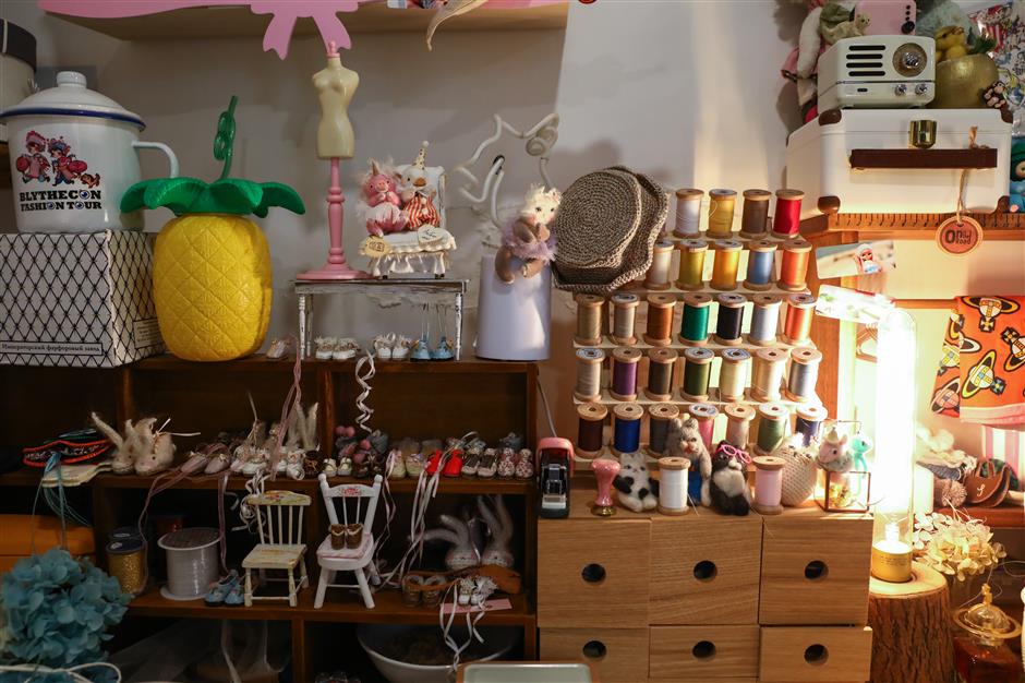 A designer and dressmaker who thrives in a very small world