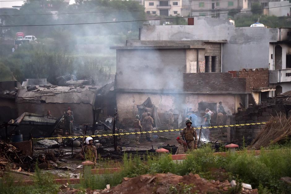 15 killed as Pakistani army plane crashes into residential area