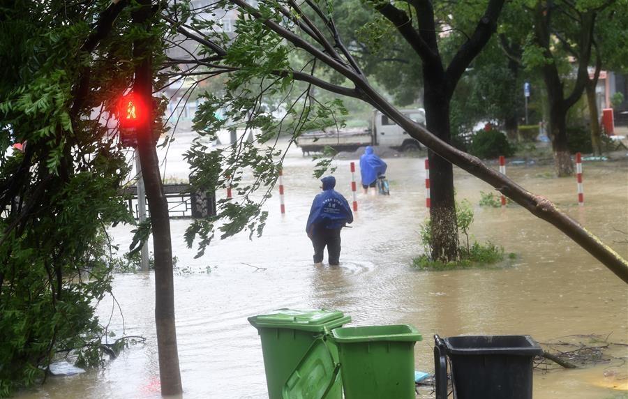 China issues orange alert as Typhoon Lekima lands