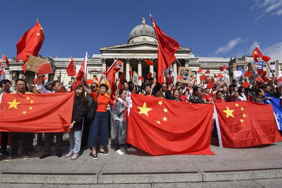 Thousands of overseas Chinese, students in London chorus 'Save Hong Kong' from violence