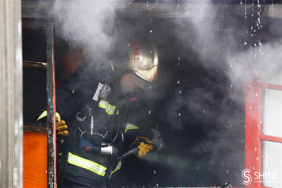 Historic shikumen blaze blankets Jing'an in smoke