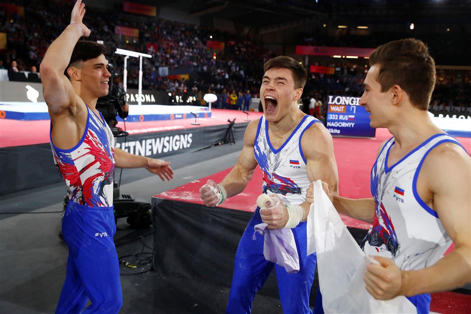 Russian gymnasts seize first men's team gold as China slips at the end