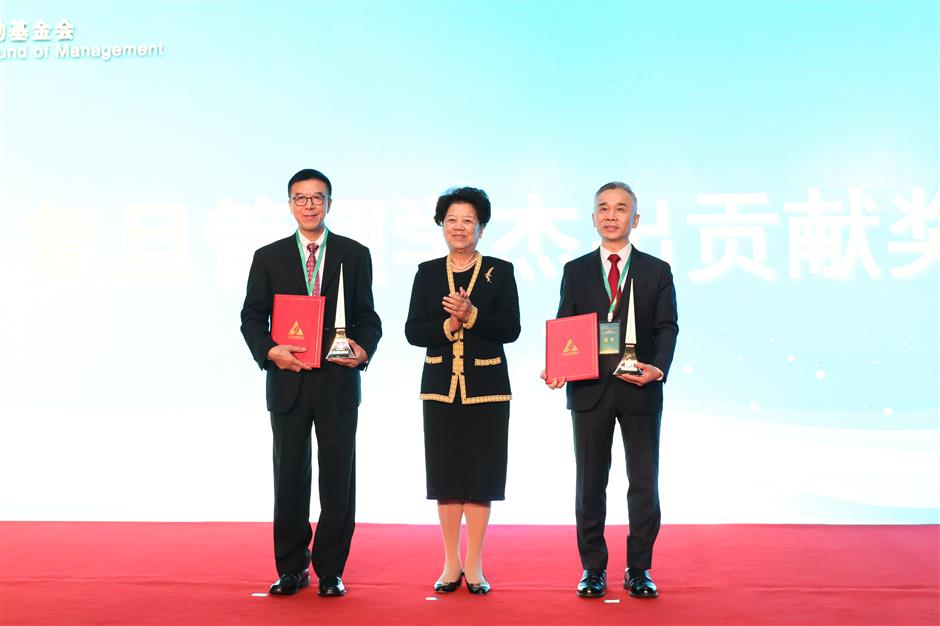 Xiaomi chief honored for outstanding contributions