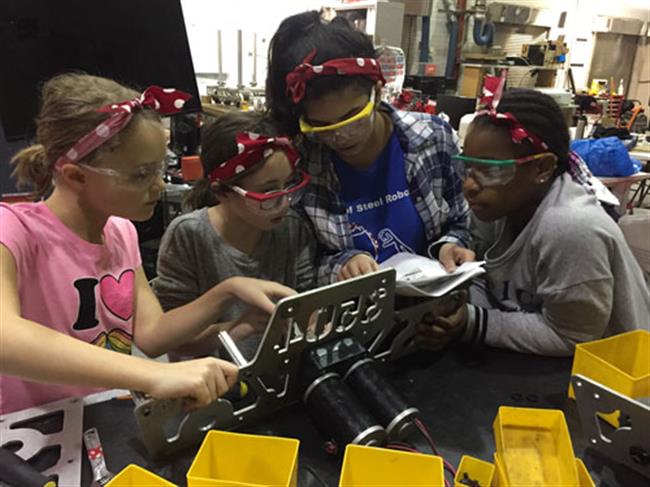 The Global Search for Education: How Building Robots Builds Confidence in Girls