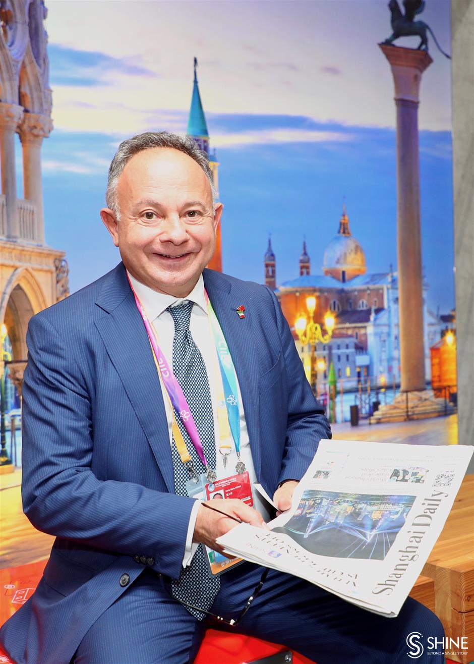ITA President Carlo Ferro shares their pavilion's highlights with Shanghai Daily
