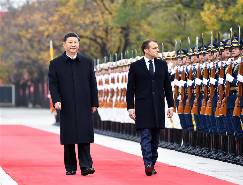 China, France sign deals worth US$15b, defend Paris climate pact ...