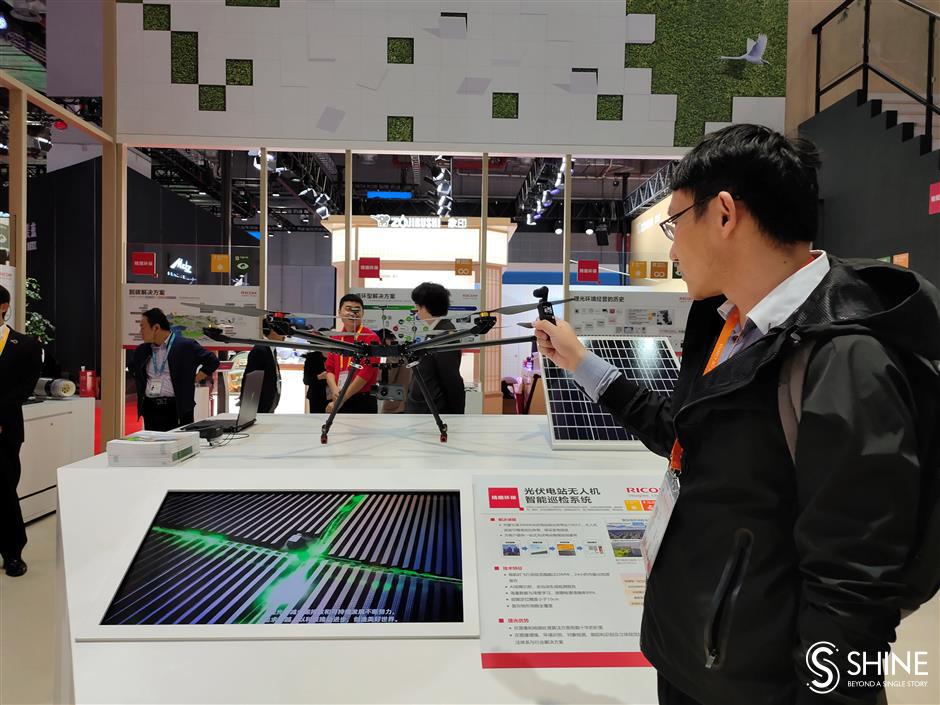 Happy Journalists' Day: day 4 of CIIE through Shanghai Daily's lens