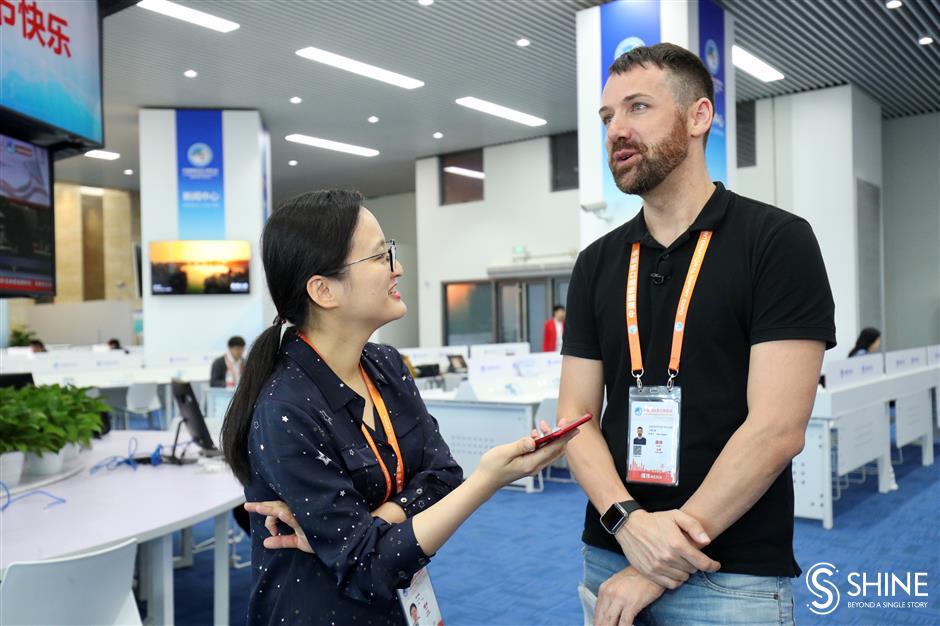 Happy Journalists' Day: day 4 of CIIE through Shanghai Daily's lens