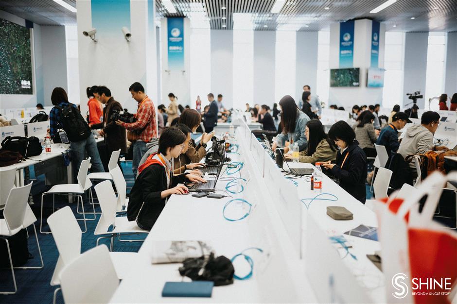 Happy Journalists' Day: day 4 of CIIE through Shanghai Daily's lens