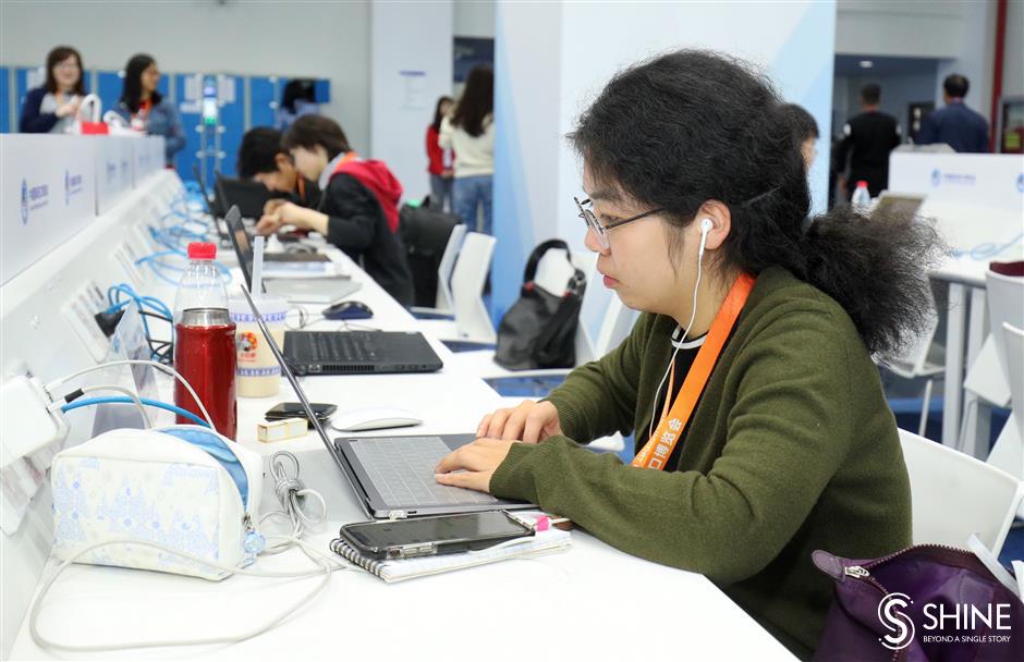 Happy Journalists' Day: day 4 of CIIE through Shanghai Daily's lens