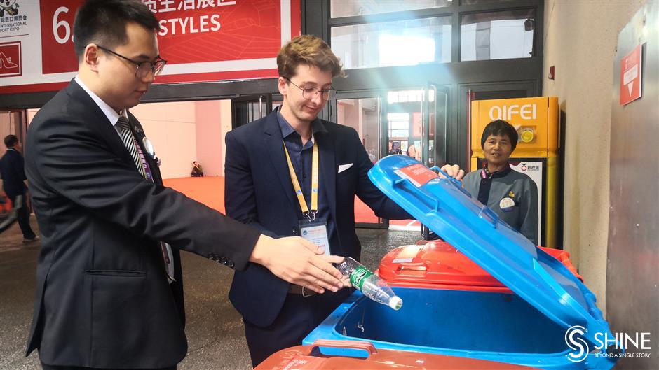 International CIIE exhibitors happy to sort their trash