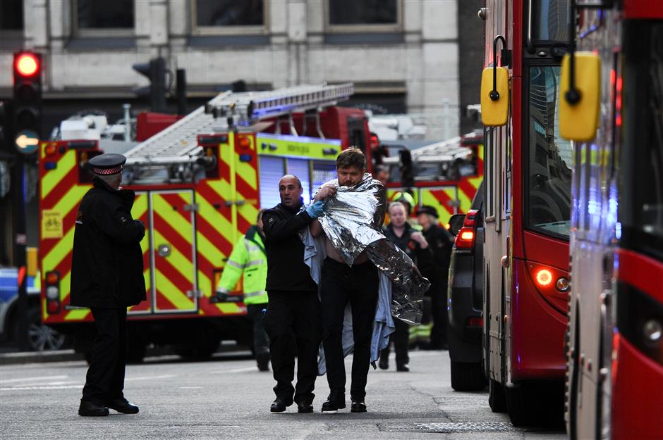 Knifeman shot dead at London Bridge, incident treated as terror-related