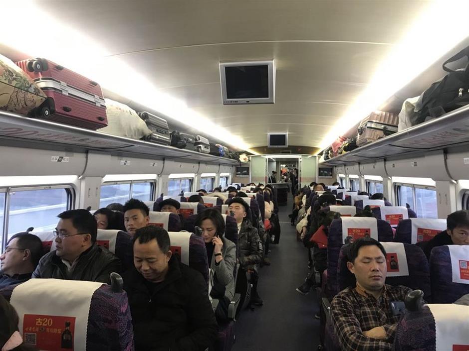 China's expanding high-speed railway makes journeys home easier, cozier