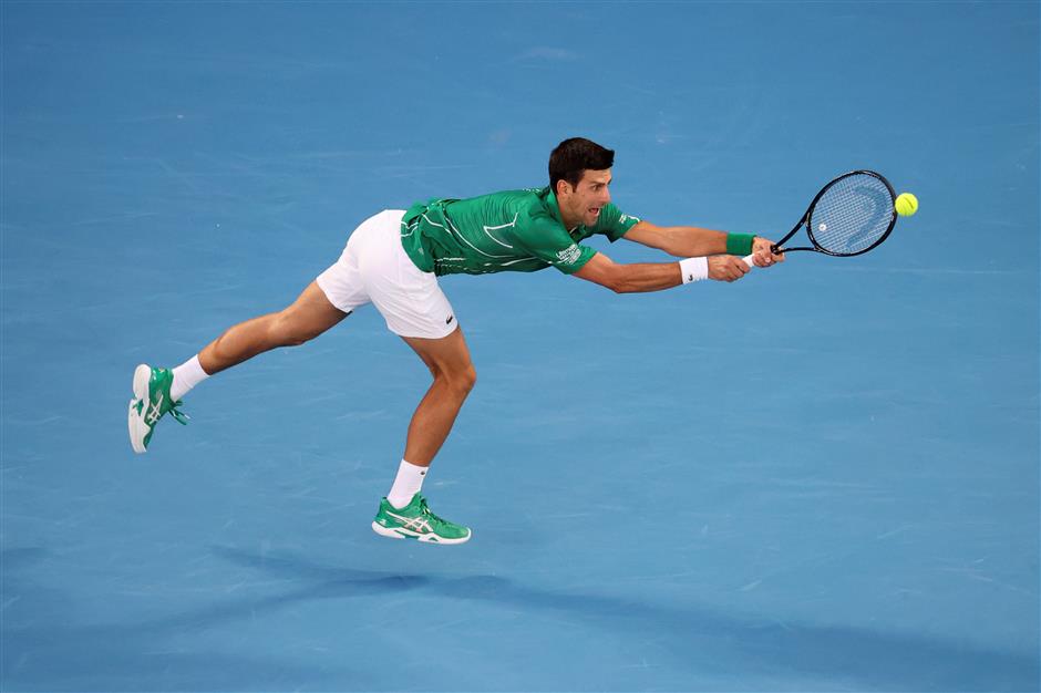 Djokovic beats Thiem in five-set epic to win eighth Australian Open