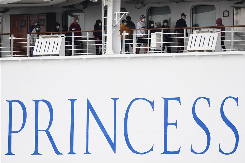 Japan to begin moving some off quarantined cruise ship