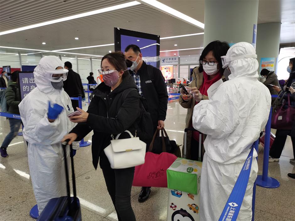 Airport staff ensure passengers are safe