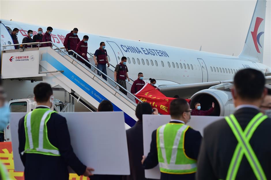 Shanghai's heroes arrive home from Wuhan