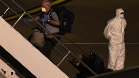 Passengers from virus-stricken ship land in Australia - World News