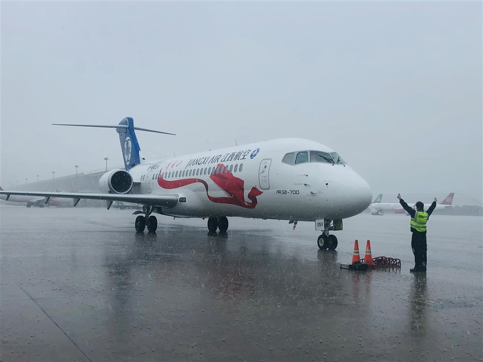 Shanghai first as domestically developed jet lands at Pudong