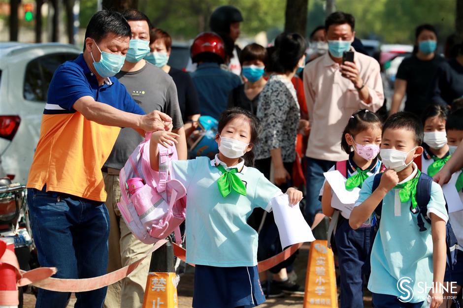 Shanghai's youngest students return to school