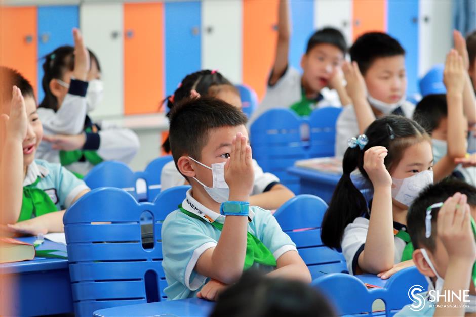 Shanghai's youngest students return to school