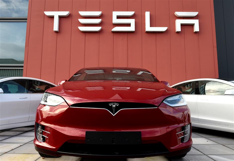 Highflying Tesla reports surprise profit despite COVID-19 upheaval