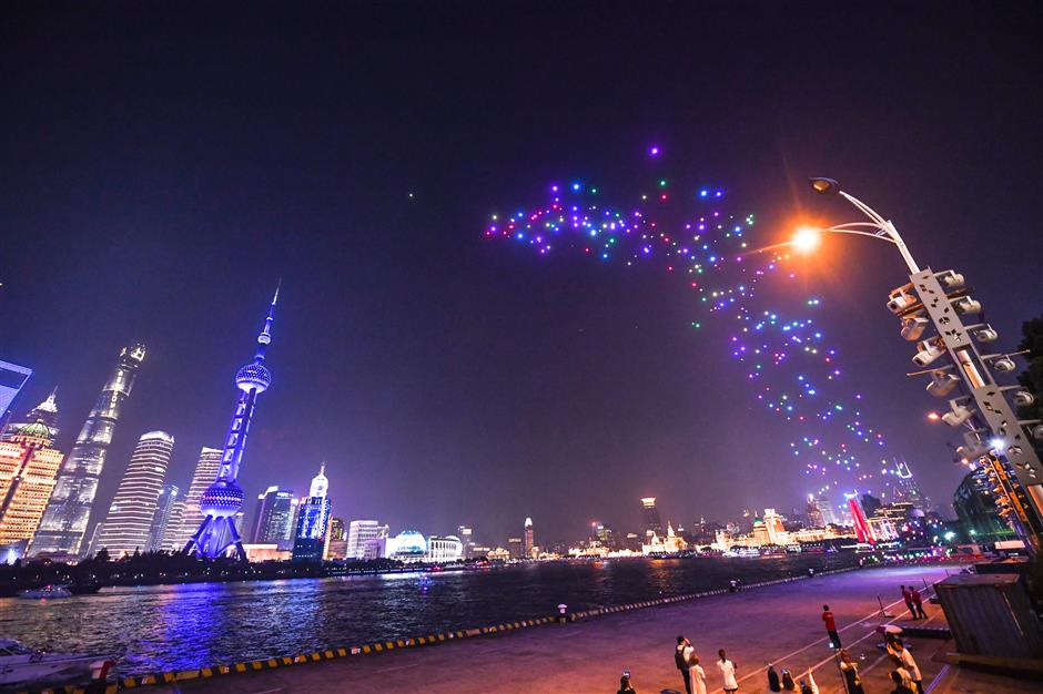 Huangpu River waterfront lights up with UAV show