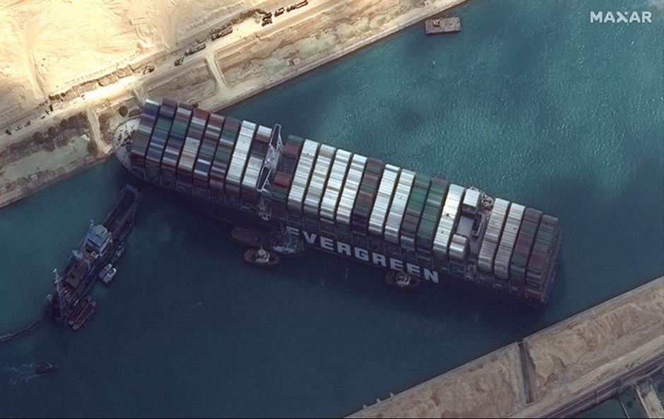 Megaship blocking Suez Canal may be refloated Saturday owner