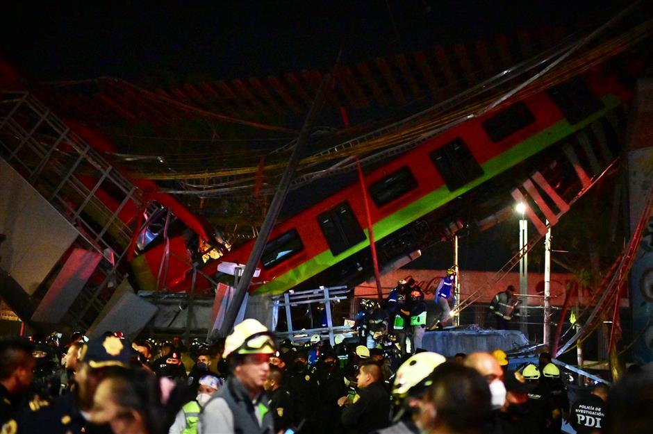 Mexico City rail overpass collapses, killing 15