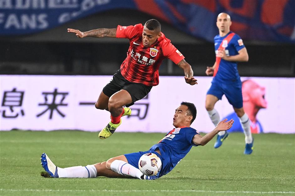 Late Bassogog penalty earns Shenhua draw in Shanghai derby