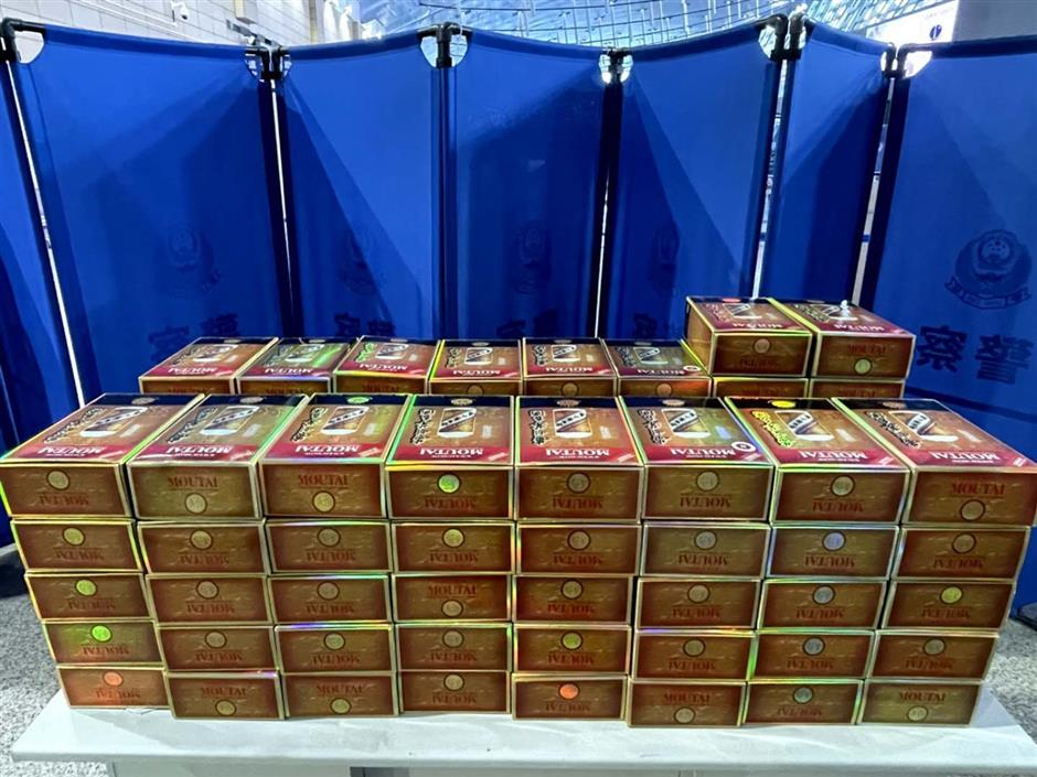 Passenger found with 82 bottles of Moutai