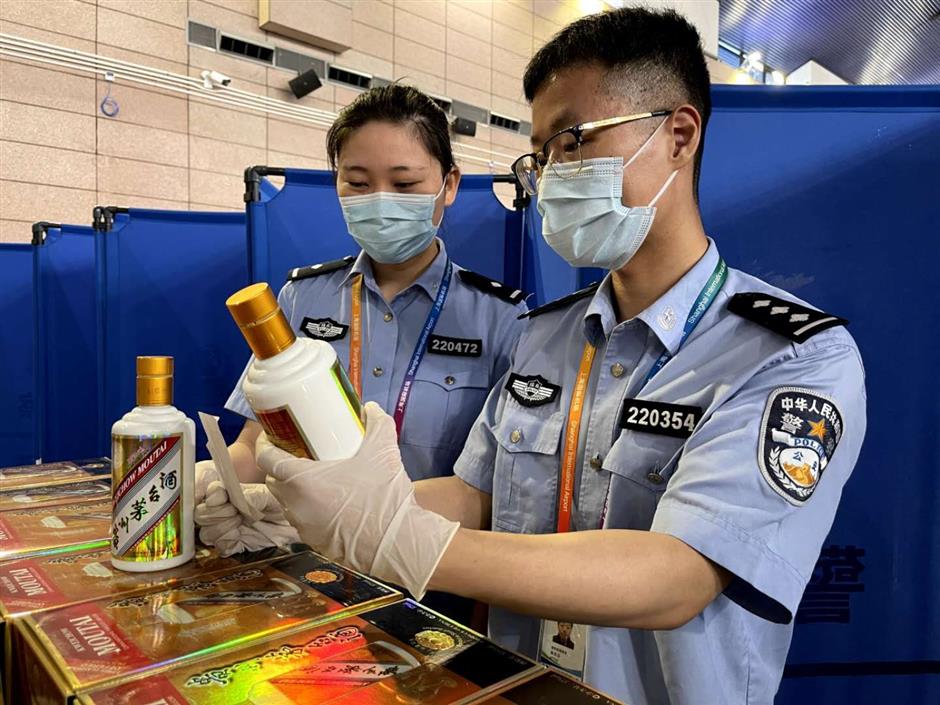 Passenger found with 82 bottles of Moutai