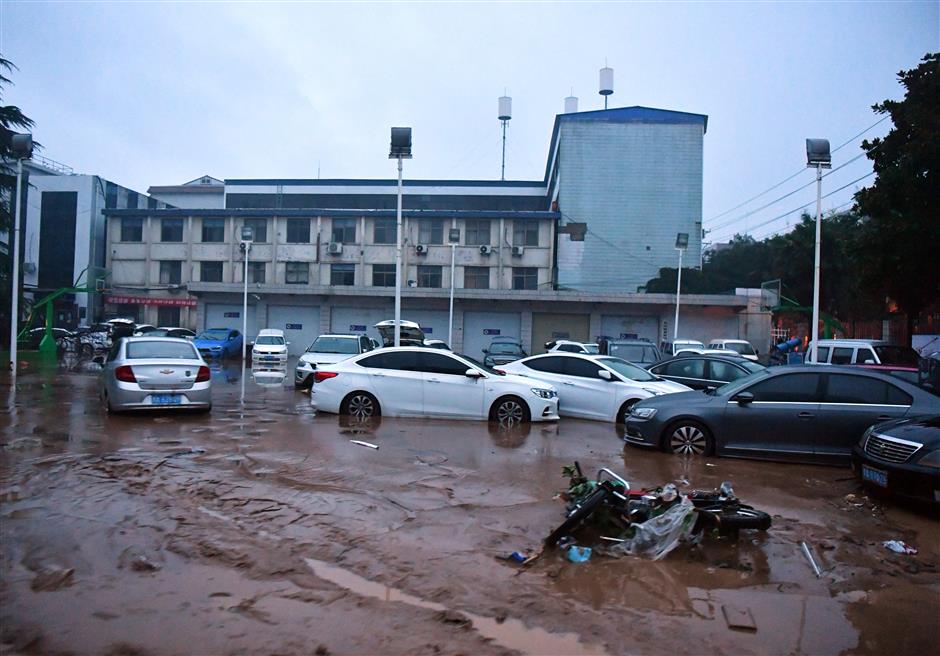 China's rain-ravaged Henan activates highest-level emergency response