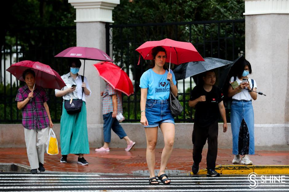 Heavy rain lashes city as Typhoon In-Fa nears