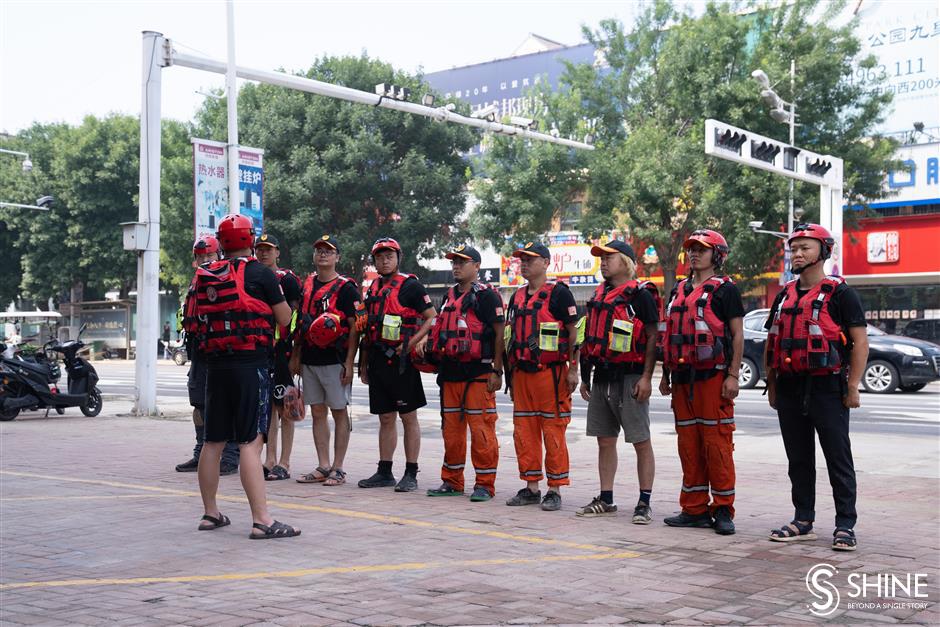 Shanghai rescue team supporting Henan floods heads back to help with typhoon