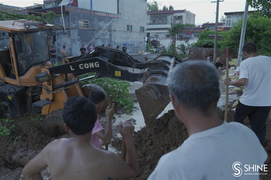 Flood waters still pose a threat for many villages in Henan