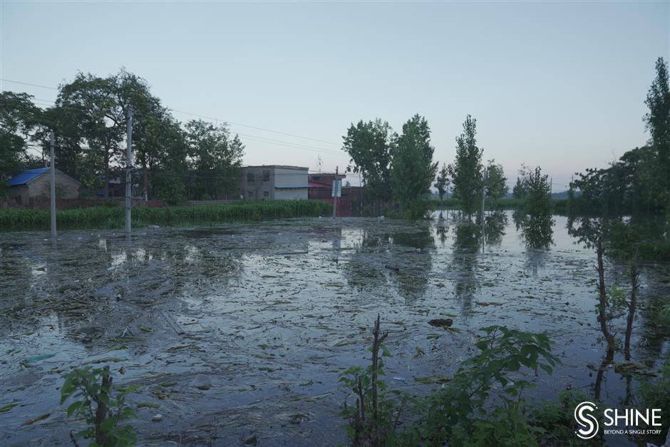 Flood waters still pose a threat for many villages in Henan