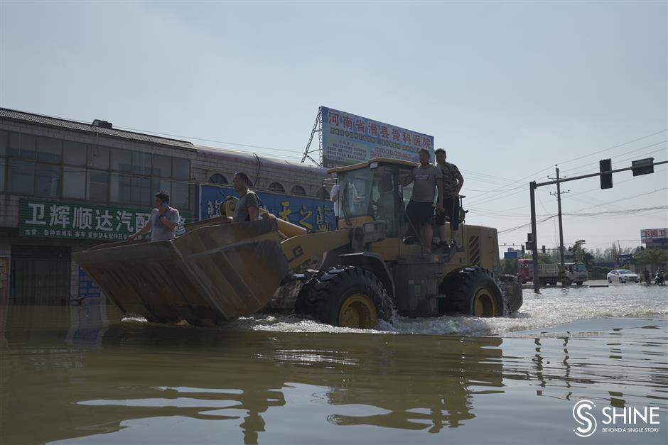 Flood waters still pose a threat for many villages in Henan