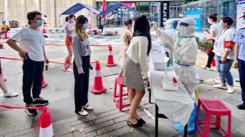 China aims to balance COVID-19 control, economic growth