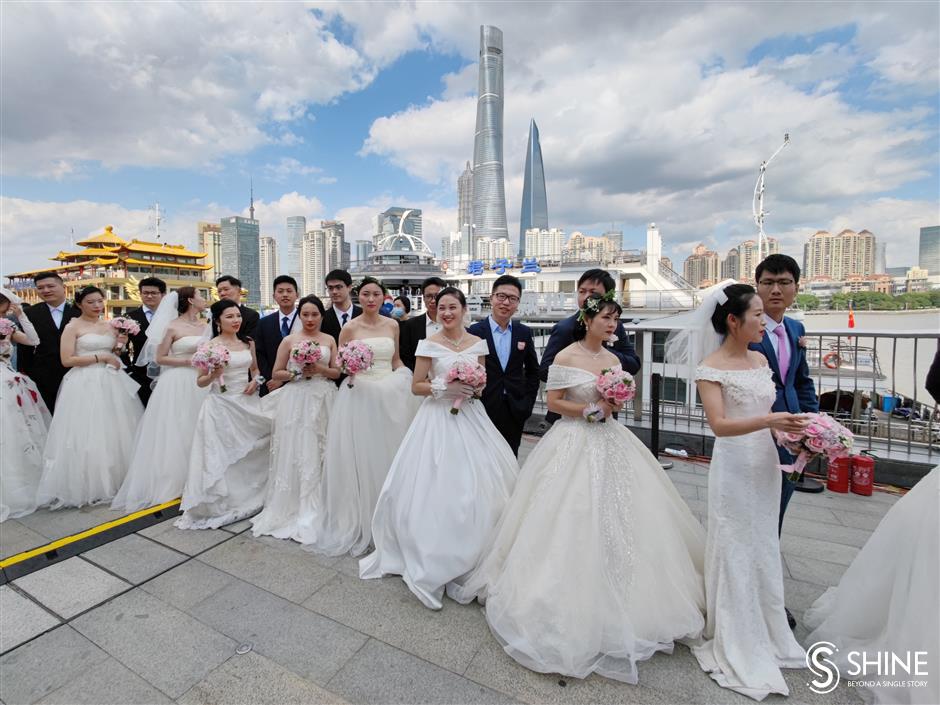 Group wedding a bed of roses for couples