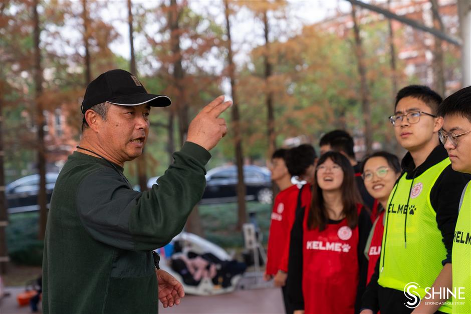 Varsity students ride the dragon boat wave