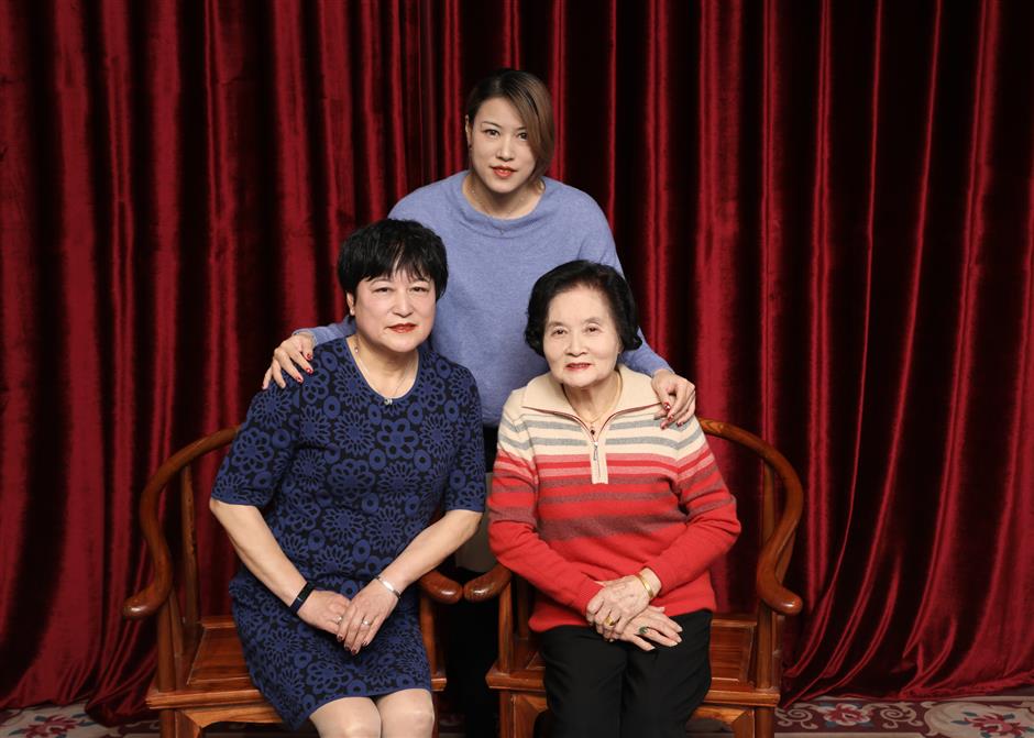 Taking a family photo at century-old studio to celebrate New Year