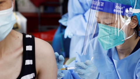 Shanghai pushes COVID-19 booster shots as community cases resurface - Vimarsana News