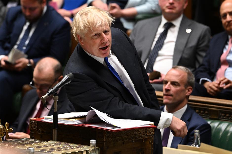 Boris Johnson 'up for a fight' as clamor to quit grows