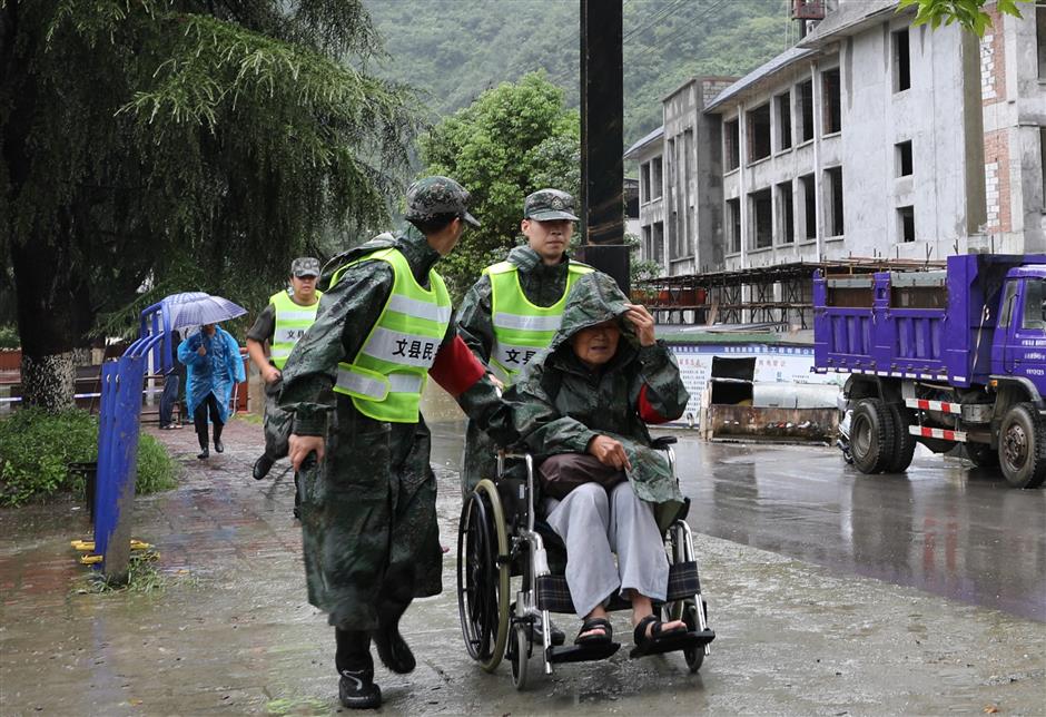 Spirited rescuers fight floodwaters and save lives