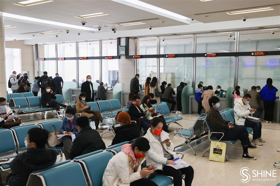 A busy day for immigration officials at the Shanghai exit-entry bureau