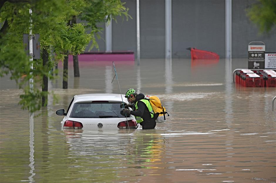 Five dead, Grand Prix postponed after flooding in northern Italy