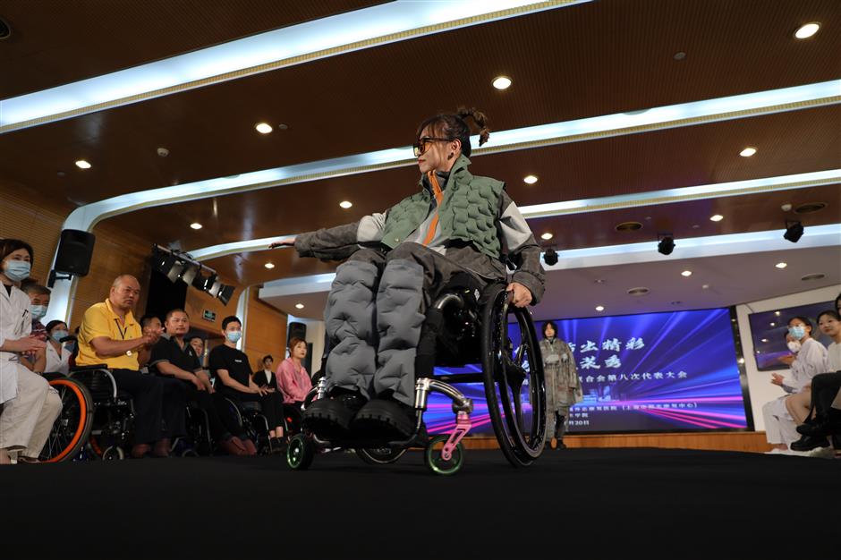 Wheelchair-bound models hit the ramp in a unique fashion show