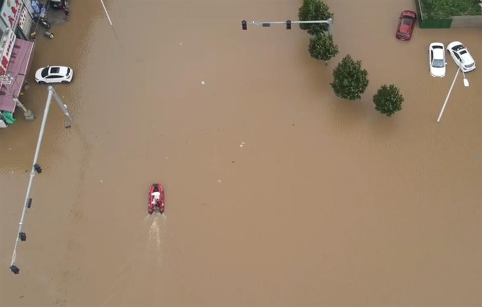 Shanghai's 1st rescue force springs into action in flood-ravaged Zhuozhou