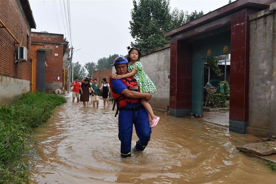 Battered by heavy rainfall, Zhuozhou fights through deadly floods
